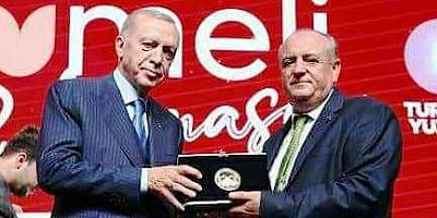  Erdoğan Mamuşa'lı Arif Bütüç'ü onurlandırdı